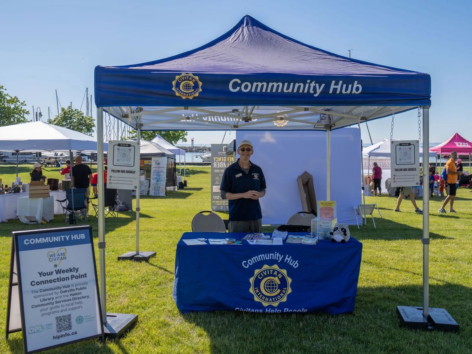 Al McMullan of the Civitan Club of Oakville at the Civitan Community Hub tent at the Mercedes-Benz Oakville Bronte Harbour Classic 5K, Bronte Heritage Waterfront Park, June 21, 2026